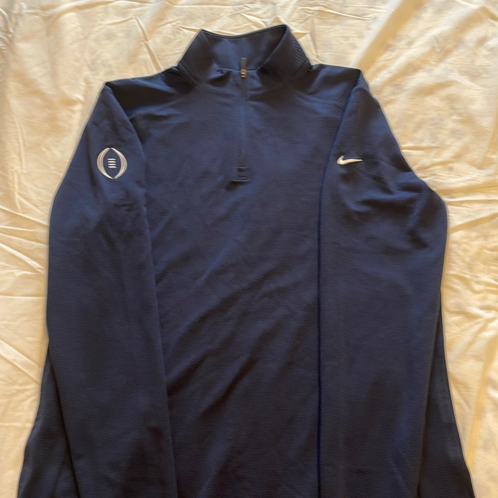 Nike quarter zip dry fit with football logo.  Size L
